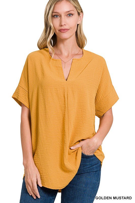 WOVEN AIRFLOW SPLIT NECK SHORT SLEEVE TOP