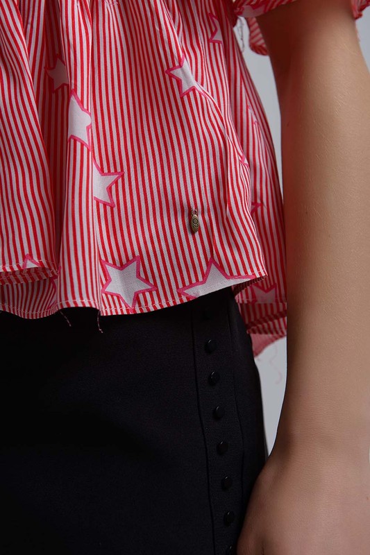 Red top with stars and ruffle