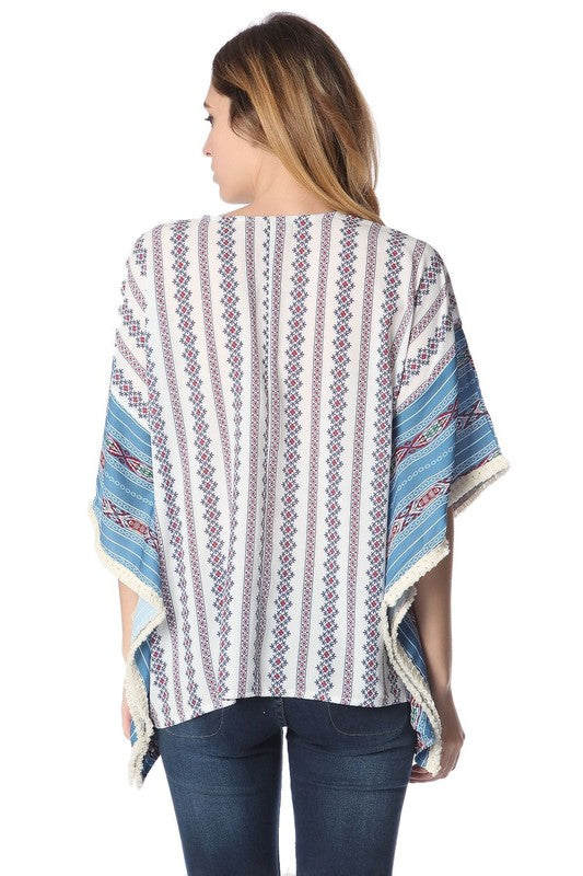 Blue oversized poncho top in tribe print