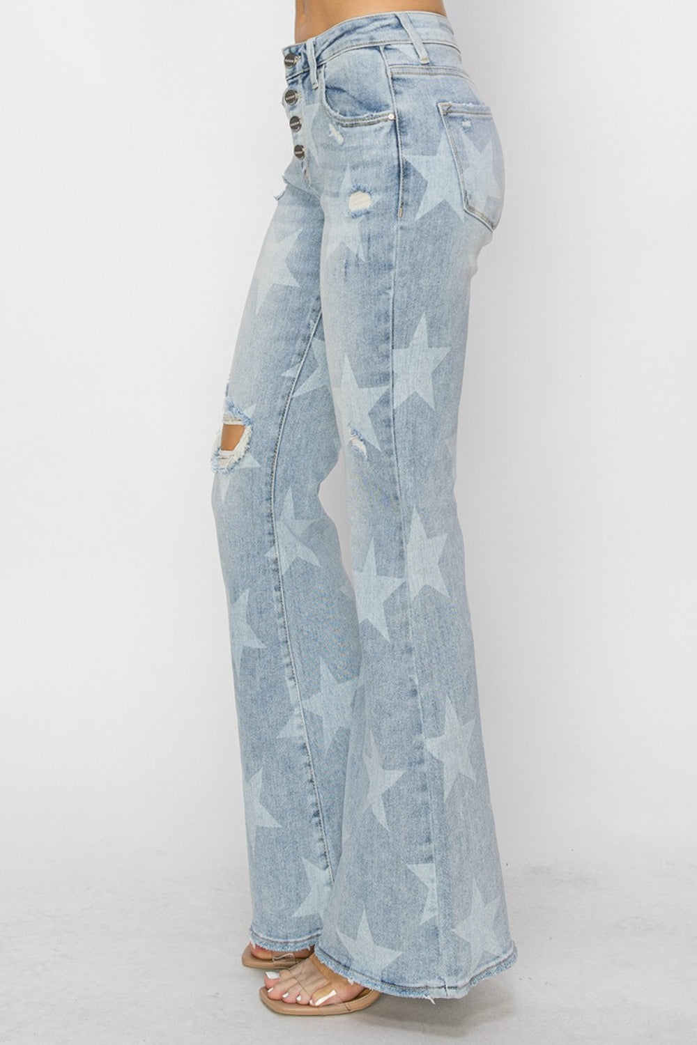 RISEN Mid Rise Button Fly Start Print Flare Jeans